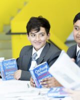 east london school pupil reading oxford dictionary